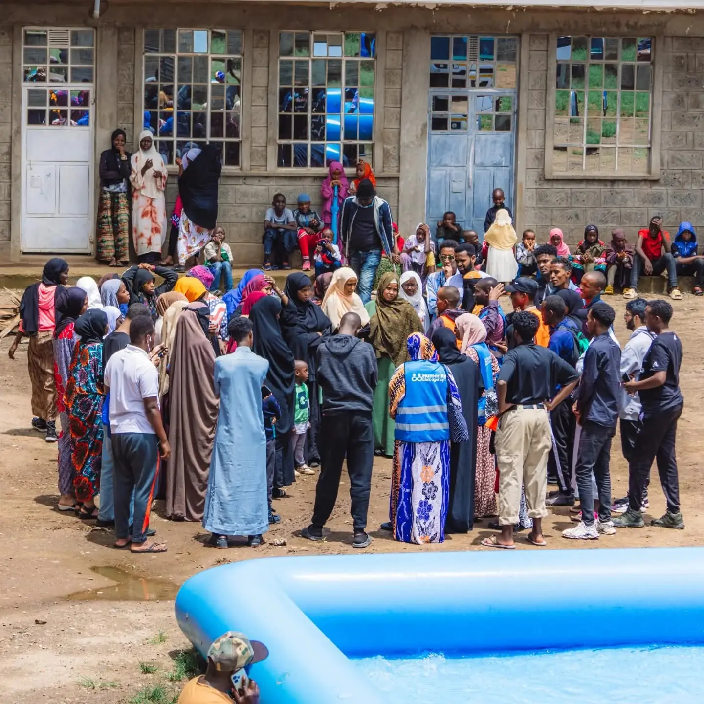 A large group gathered outside Villa Teag Children's Home